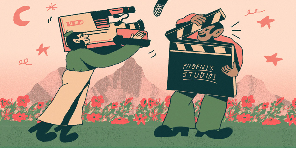 An illustration of a man with an oversized camera filming another man holding a clapper board that says Phoenix Studios.