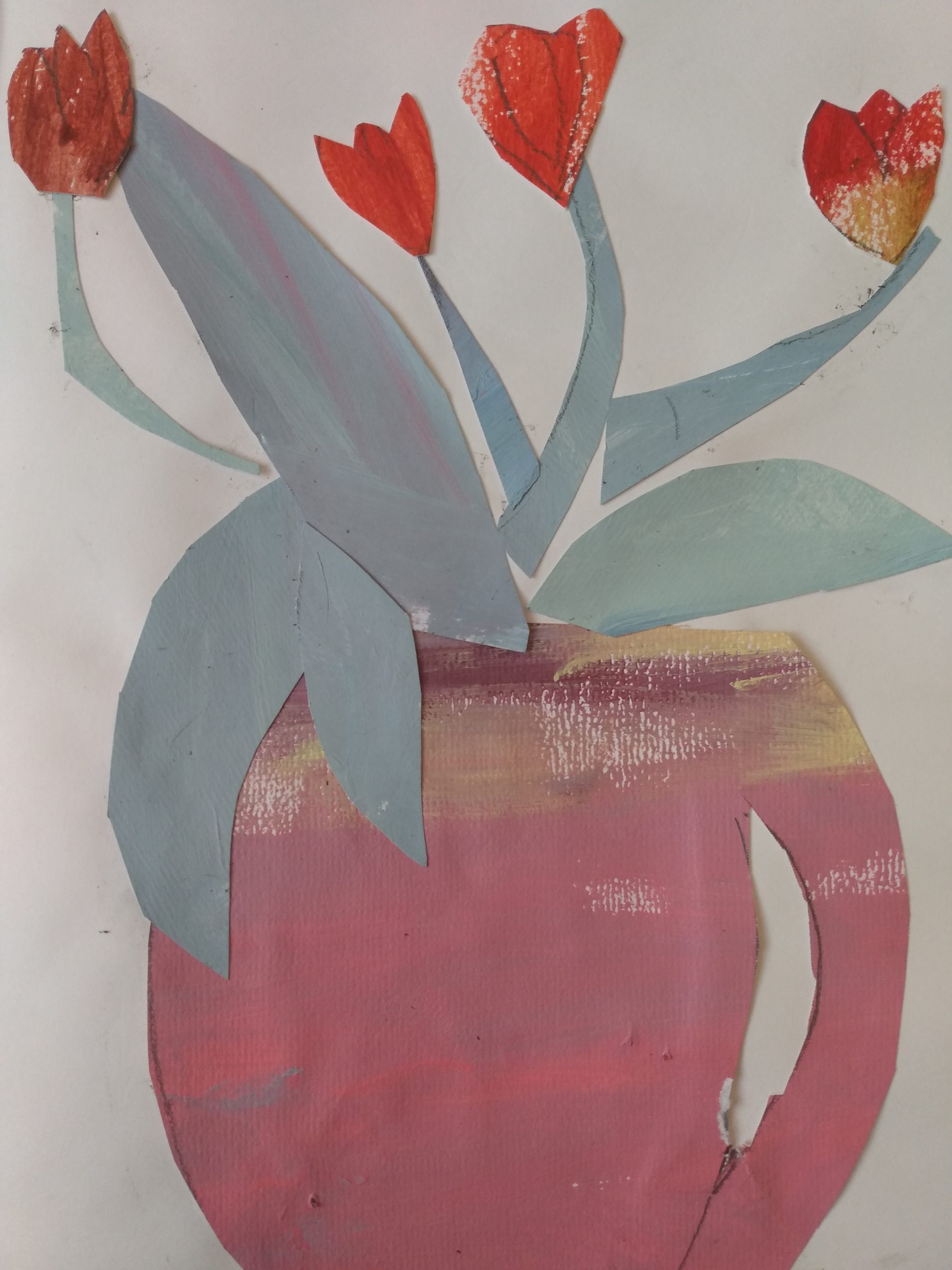 A textile portrait of four red tulips with thick blue-grey leaves and stalks, sprouting from a pink vase. The background is cream-coloured.