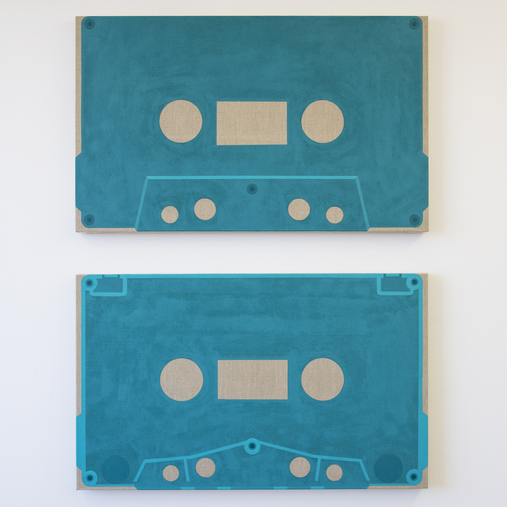 Two canvas paintings of cassette tapes. The cassettes are entirely blue and have no labels or tape.