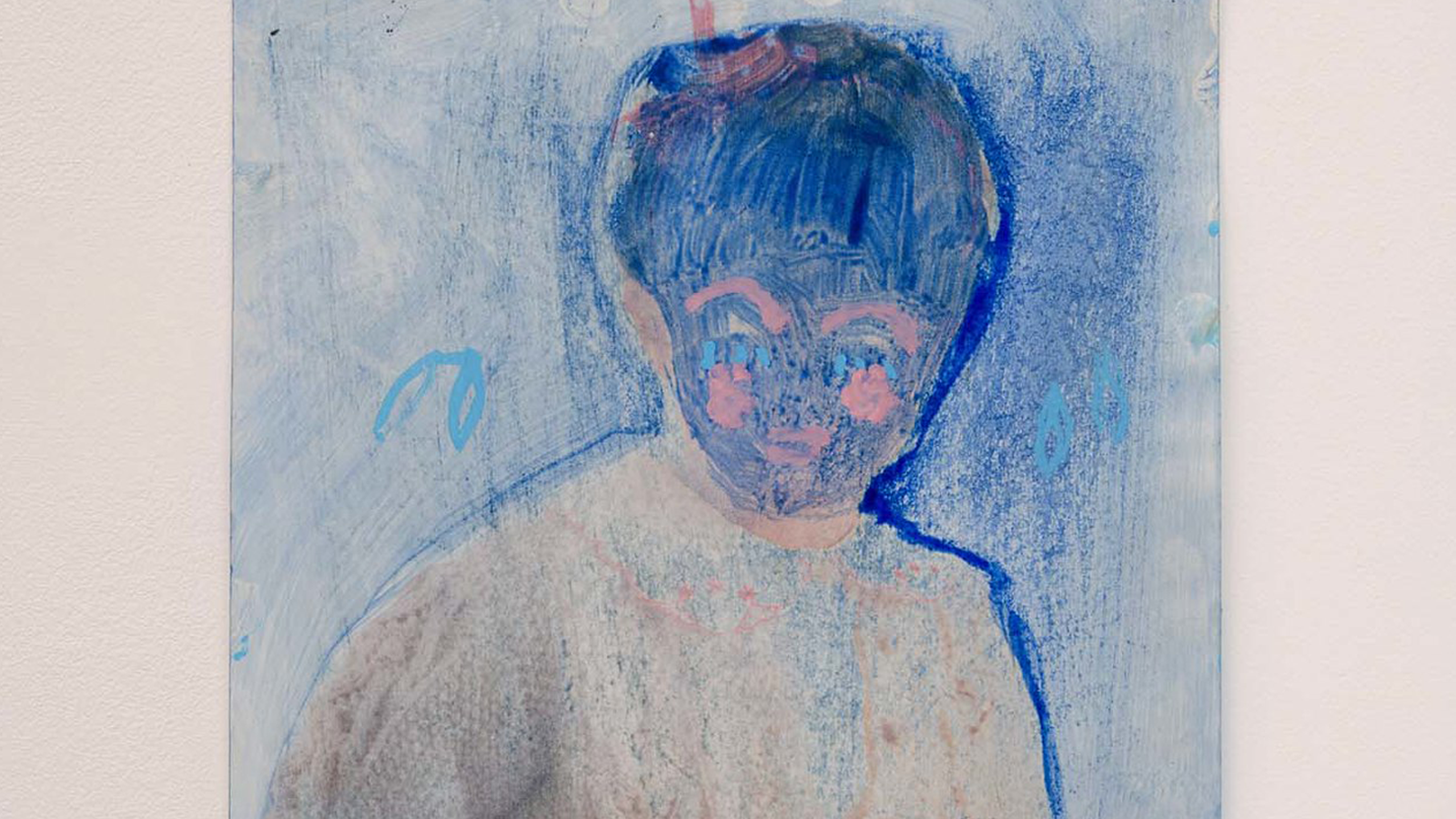 A collage and drawing of a person where the face has been painted blue