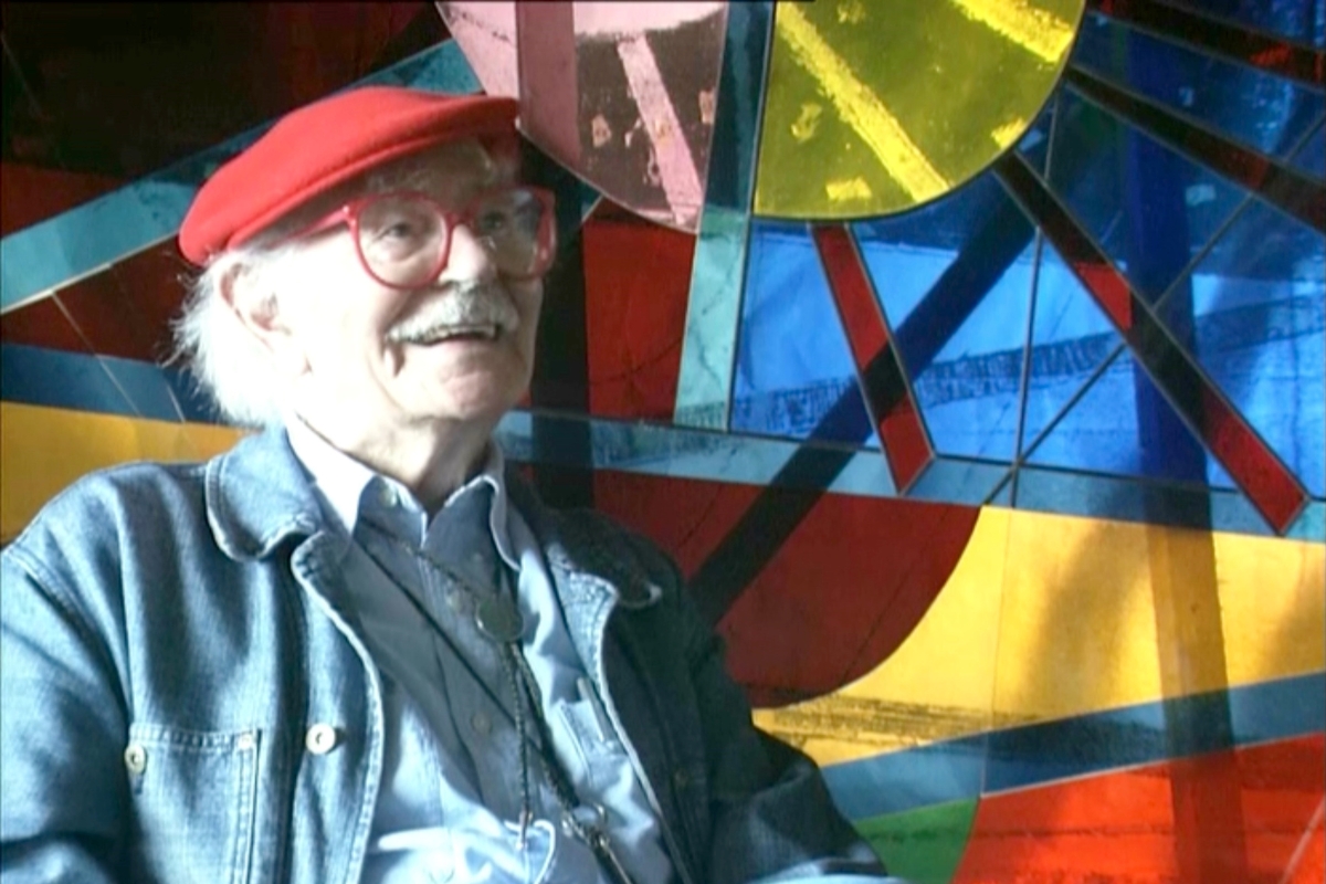Sir Terry Frost RA sat in front of Sun and Moon Window in the studio, 1998