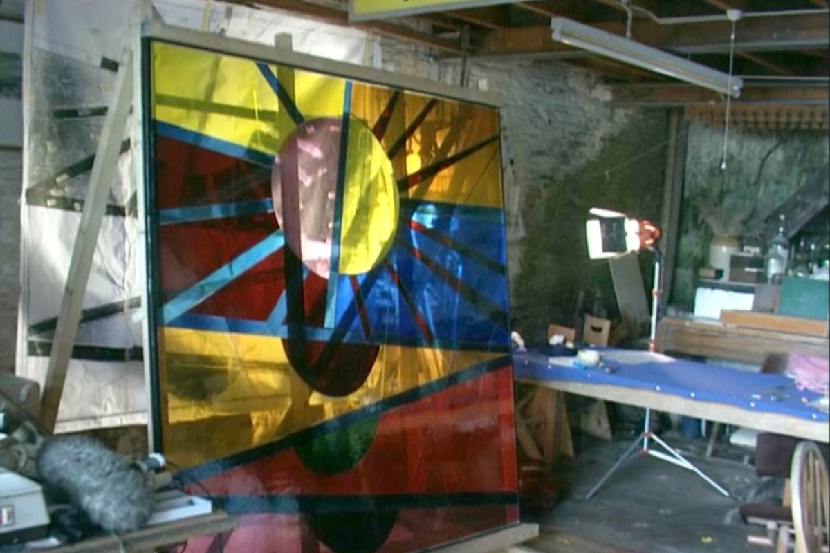 The Sun and Moon Window in Sir Terry Frost RA's studio with paper drawing behind