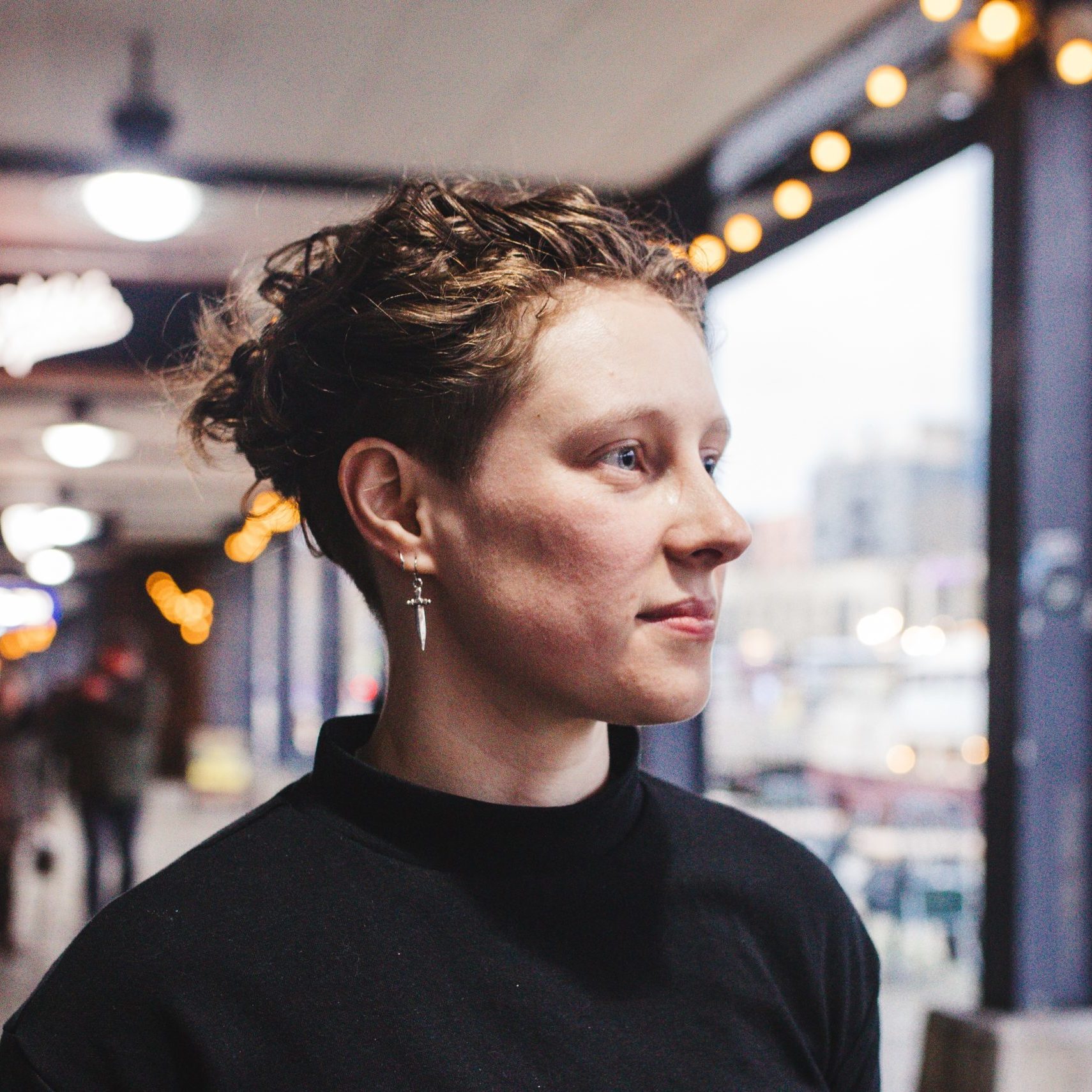 A woman with knife earrings.