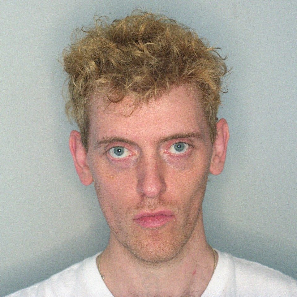 Man staring into camera.